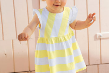 gestreiftes Mädchenkleid für Babys gelb gestreift