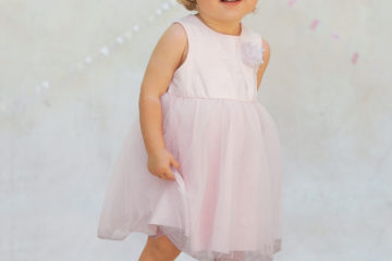 Ärmelloses Babykleid für Mädchen rosa bedruckt/beige glanzeffek